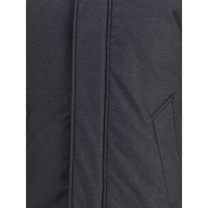 Close-up of Woolrich Black Fleece Wool Parka showing side welt pocket detail and flap closure.