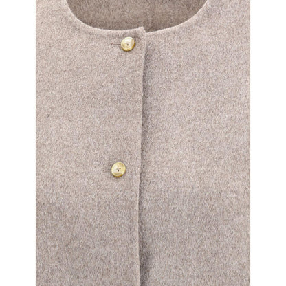 Close-up of Loulou De Saison Gray Wool Coat with front button closure and crew neck design, highlighting minimalist style and quality wool texture.
