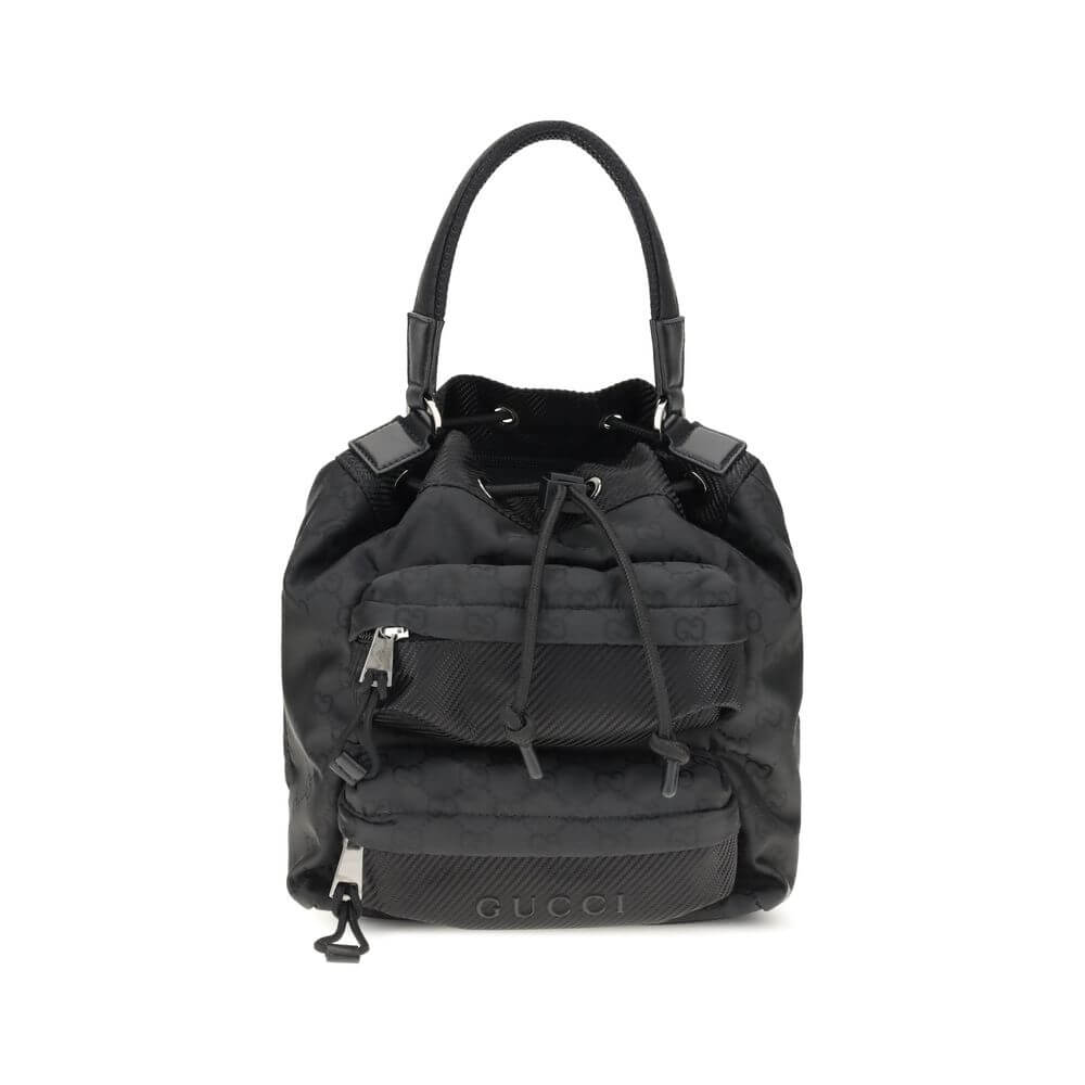 Gucci Black Polyamide Backet Bag featuring GG Supreme pattern and zippered pockets, ideal for stylish organization.