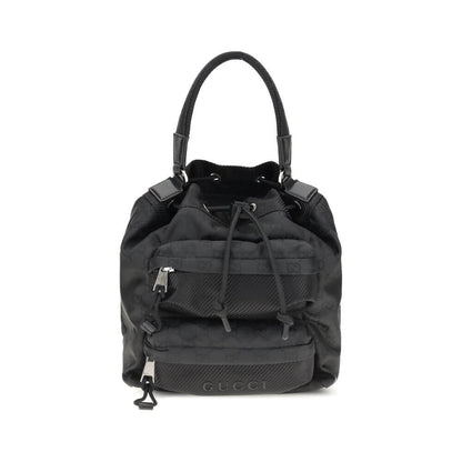 Gucci Black Polyamide Backet Bag featuring GG Supreme pattern and zippered pockets, ideal for stylish organization.