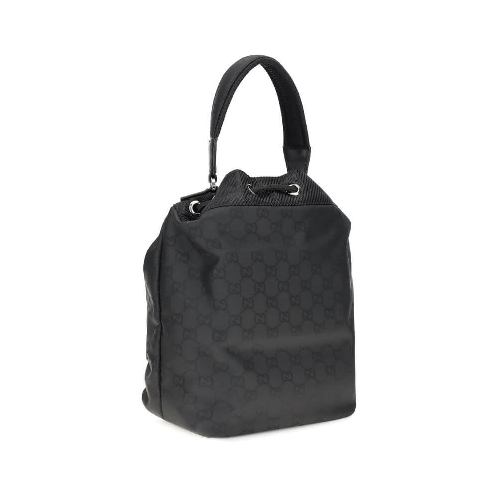 Gucci Black Polyamide Backet Bag with GG Supreme pattern, drawstring closure, and rigid handle showcasing stylish functionality.