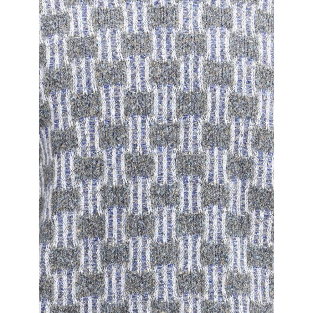 Close-up of Giorgio Armani Light Blue Cotton Turtleneck fabric showing two-tone graphic pattern texture.
