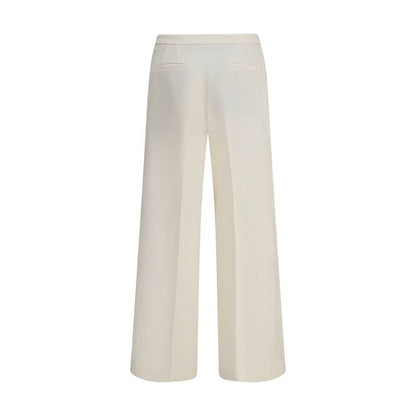 Back view of Cruna Cream Polyester Casual Pants showing wide leg and clean silhouette.