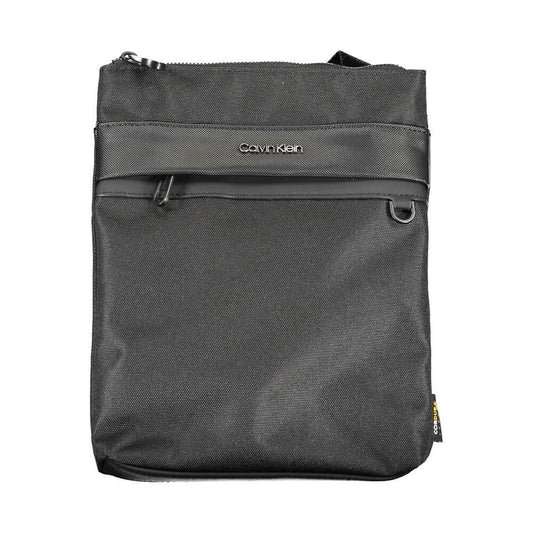 Calvin Klein Black Polyester Shoulder Bag with adjustable strap, zip closure, contrasting details, external and internal pockets.