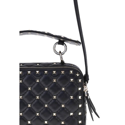 Valentino Garavani Black Lamb Ovis Aries Aries Shoulder Bag with gold Rockstuds and quilted design, showcasing handle and strap details.
