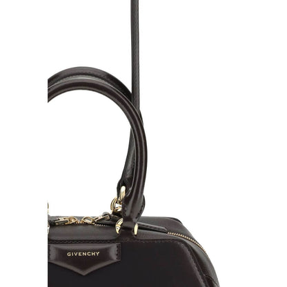 Close-up of Givenchy Brown Calf Leather Bos Taurus Handbag with gold finishes and zipper.