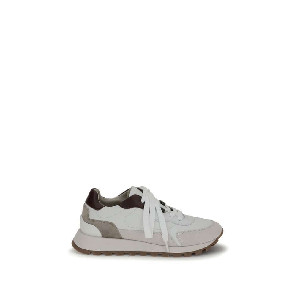 Brunello Cucinelli White Leather Athletic Sneakers with shiny details, flat cotton laces, and jewel decoration for style and comfort.