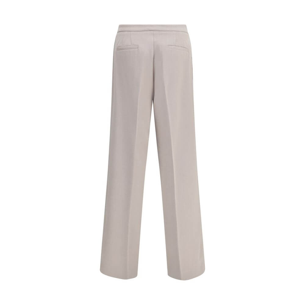 Back view of Cruna Beige Polyester Casual Pants with wide leg design, featuring rear welt pockets and clean styling for versatile wear.