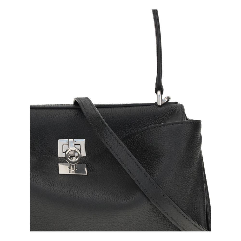Front view with bag zipped and handles upright.