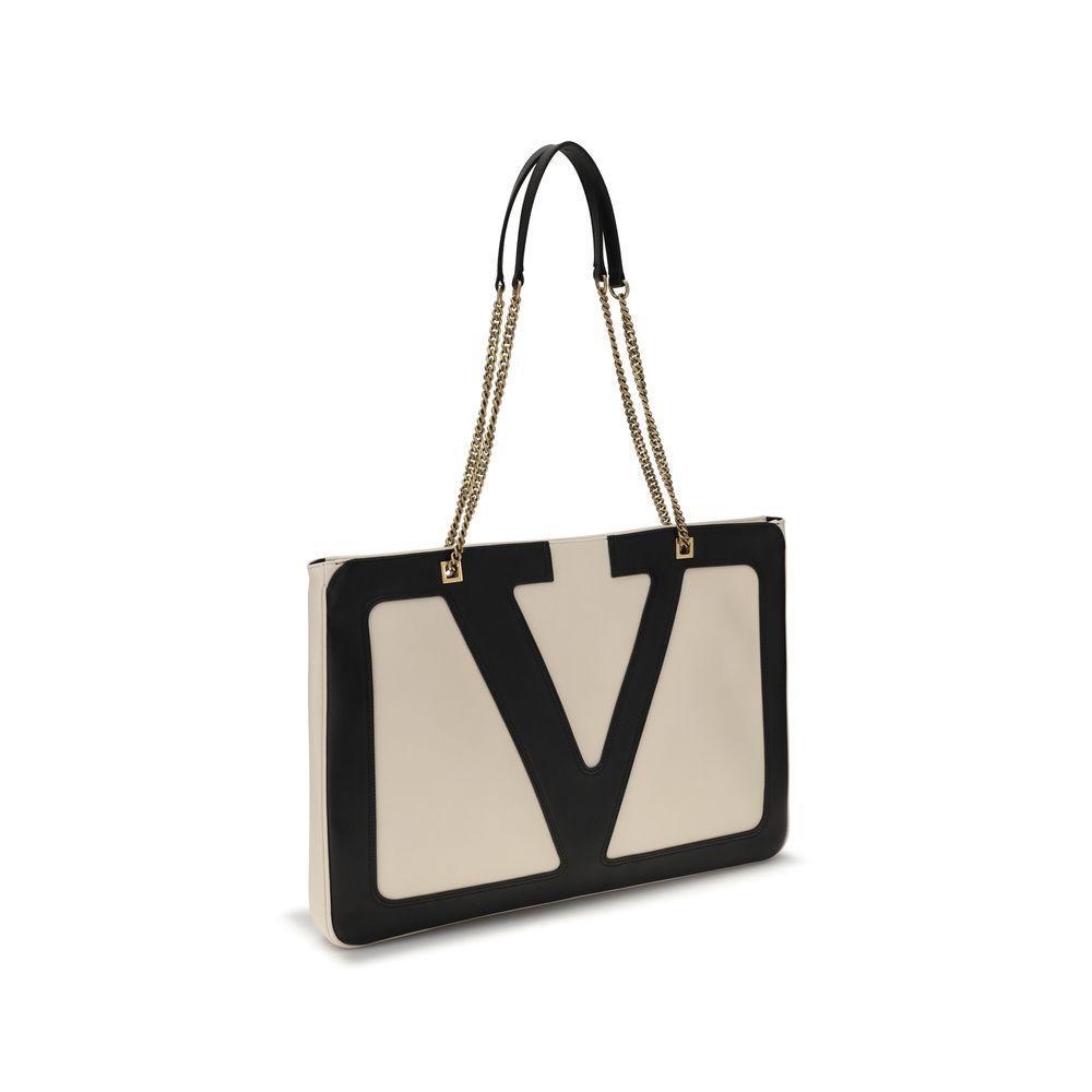 Front view with bag zipped and handles upright.