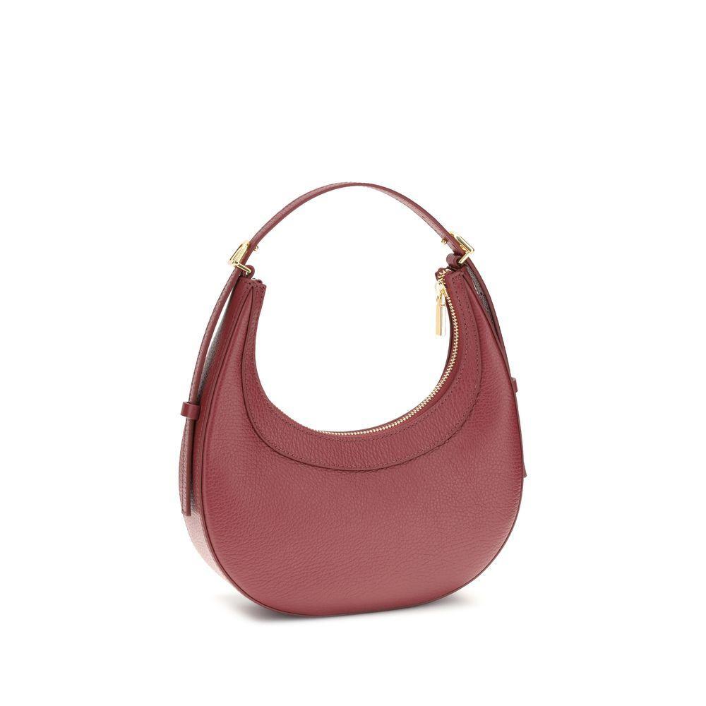 Front view with bag zipped and handles upright.