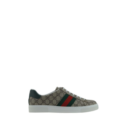 Gucci Beige Rubber Low Top Sneakers with lace-up front, GG jacquard, leather logo back, contrasting sole, side stripes, AW25 collection.