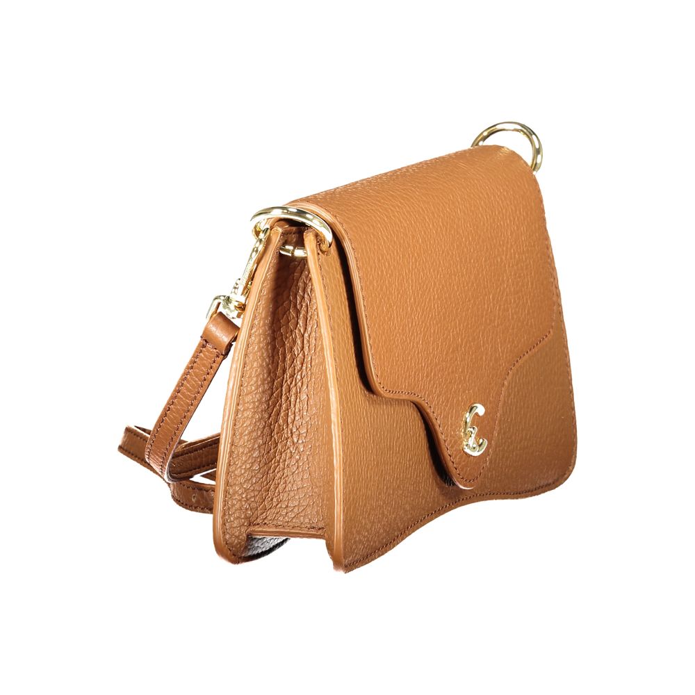 Coccinelle Brown Leather Women Handbag with adjustable strap and snap closure, showcasing luxury and modern elegance.