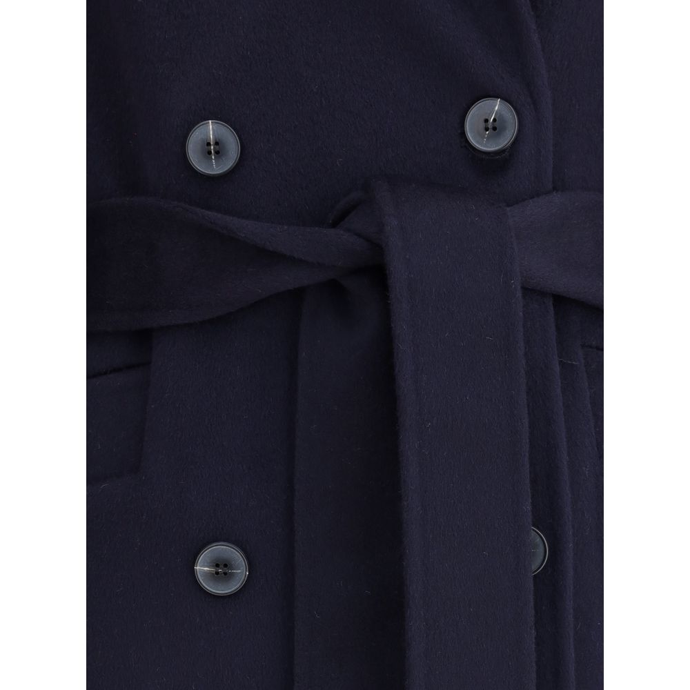 Close-up of Dynamis Studio Blue Wool Coat with button details and waist tie.