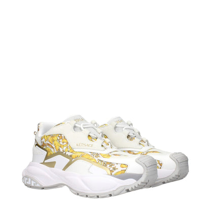 Alt Tag: Versace Gold Fabric Low Top Sneakers with logo detail in front, side, back; MPN 10163181A146866WG4V; code F84197; gold print design.