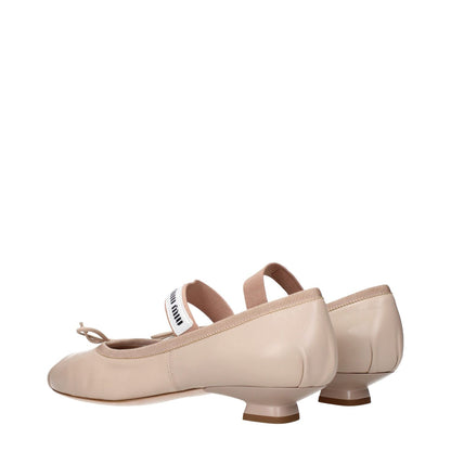 Miu Miu Pink Leather Ballet Flats with front logo and detail, side view