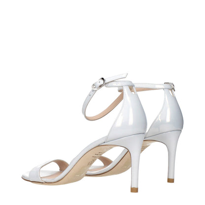 Stuart Weitzman White Leather Stiletto Heel Sandals with metallic effect, side view of elegant design and ankle strap.