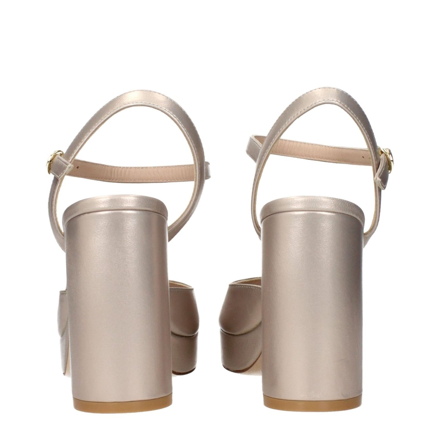 Back view of Stuart Weitzman Beige Leather Platform Sandals with metallic effect and block heels.