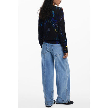 Desigual Black Polyamide Women Sweater with artistic patterns and crew neck, rear view, paired with light blue wide-leg jeans.