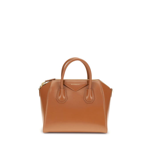 Givenchy Brown Calf Leather Bos Taurus Handbag with round handles and removable strap, glossy finish, logo, zipper closure, and interior pockets.