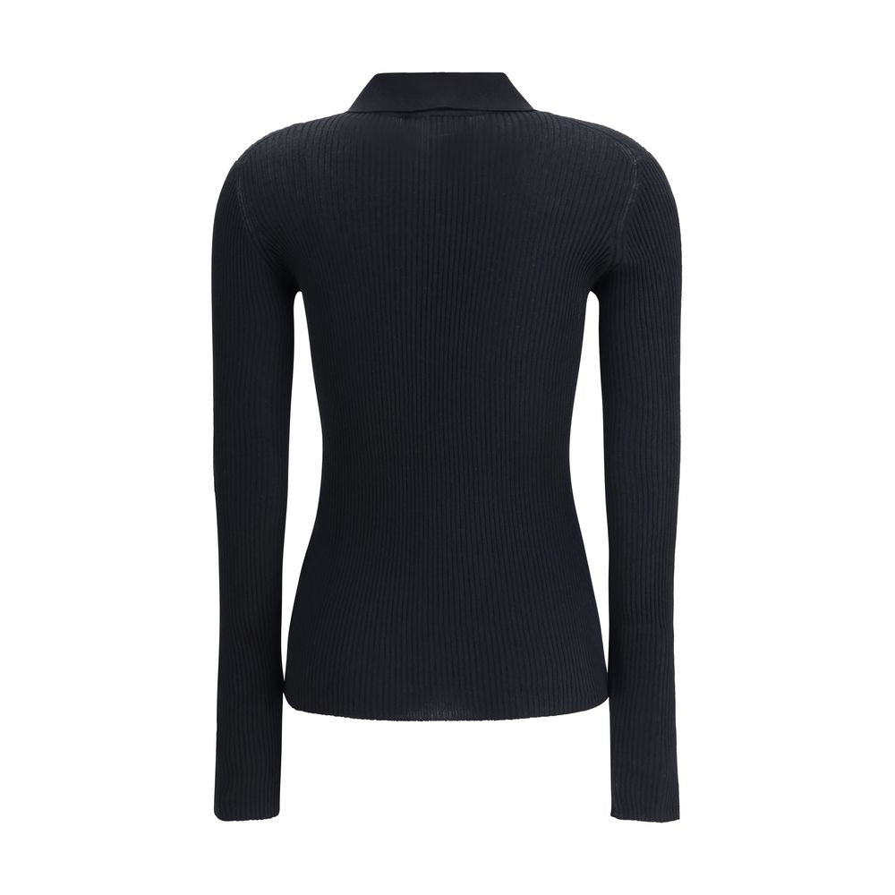 Back view of Dolce & Gabbana Black Cashmere Polo Shirt with ribbed design and classic collar, ideal for elegant and casual looks.