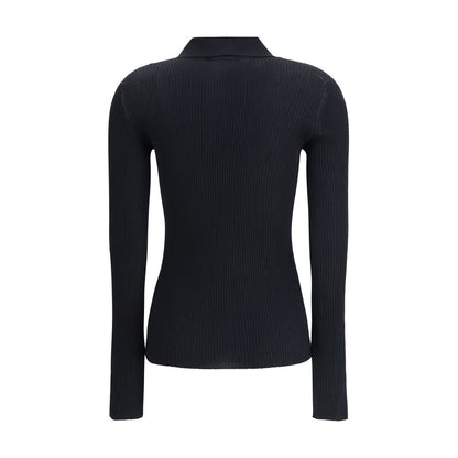Back view of Dolce & Gabbana Black Cashmere Polo Shirt with ribbed design and classic collar, ideal for elegant and casual looks.