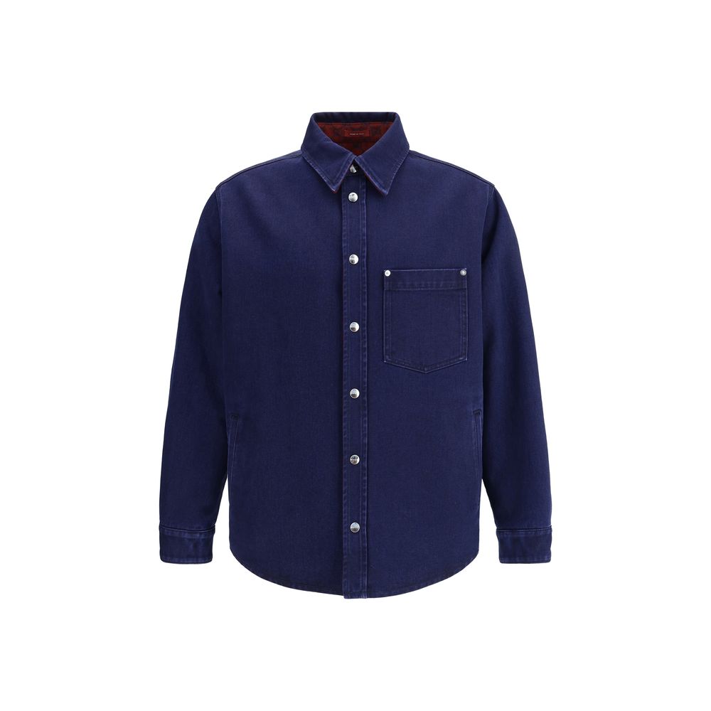 Gucci Blue Denim Shirt featuring reversible design, pointed collar, chest pocket, and Gucci metal buttons for elegant style.