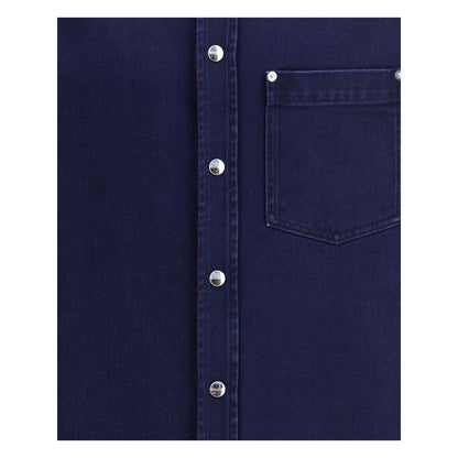 Close-up of Gucci Blue Denim Shirt featuring chest pocket and Gucci metal buttons, showcasing premium craftsmanship and style.