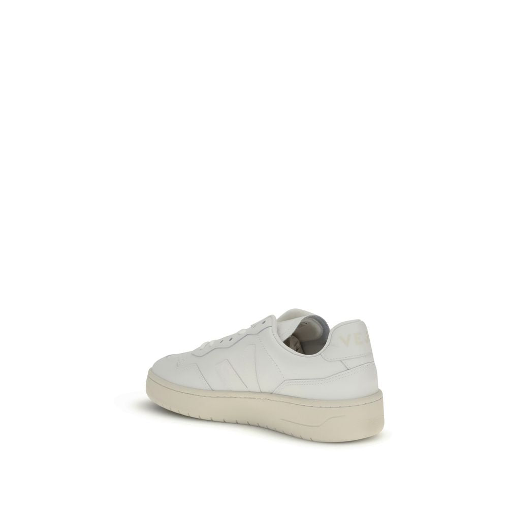 Veja White Leather Low Top Sneakers with V logo and lace-up closure, side view showcasing minimalist design and comfort.