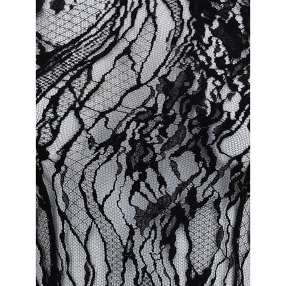 Close-up of sheer lace fabric on Balmain Black Cotton Top with intricate patterns, highlighting elegant and sophisticated design details.