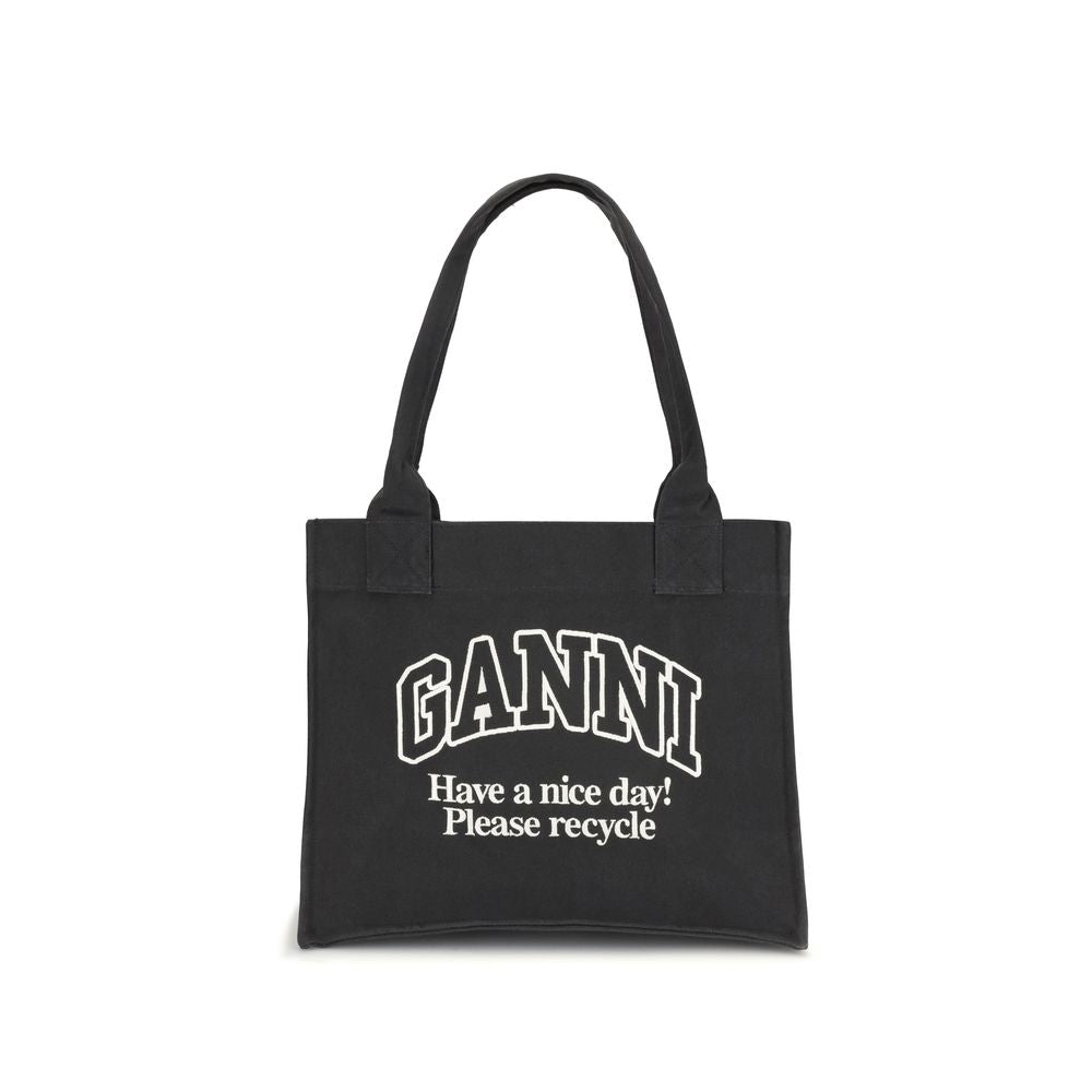 Ganni Black Cotton Shoulder Bag featuring GANNI logo with 'Have a nice day! Please recycle' message, roomy and sustainable tote design.