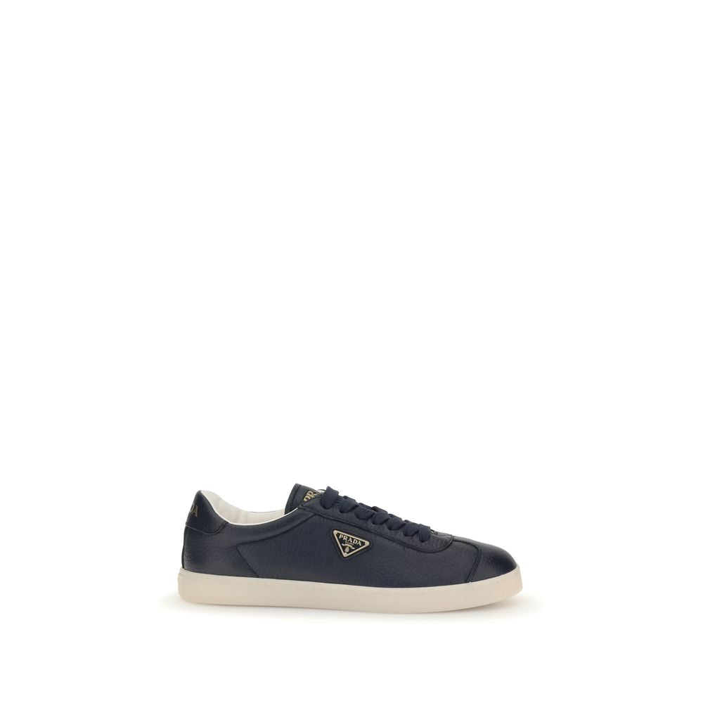 Prada Blue Calf Leather Bos Taurus Low Top Sneakers with embossed logo, lace-up closure, and padded ankle for comfort.
