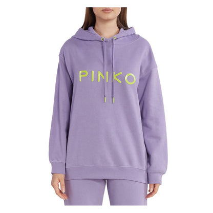 Woman wearing PINKO Purple Cotton Women Sweater with bold logo print, showcasing casual chic fashion.
