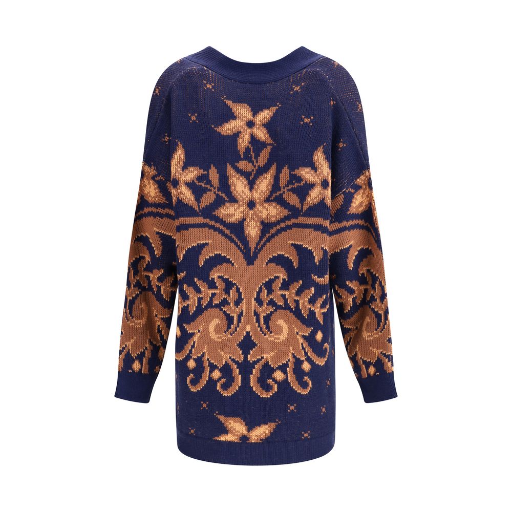 Back view of Etro Multicolor Wool Cardigan showcasing floral-inspired piazzato pattern and oversized fit, ideal for autumn-winter season.