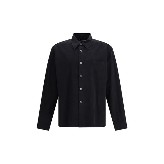 Our Legacy Black Cotton Dress Shirt crafted from lightweight Chinese poplin with pearl buttons, straight fit, and curved hem.