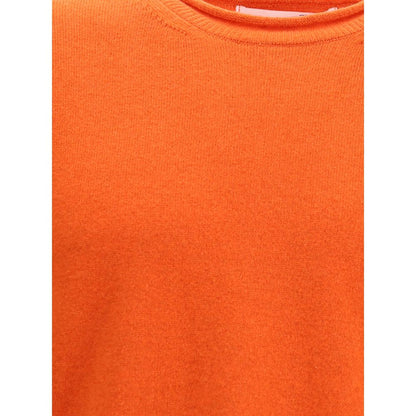 Close-up of the Comme Des Garçons Orange Wool Sweatshirt showcasing ribbed texture and round neckline.