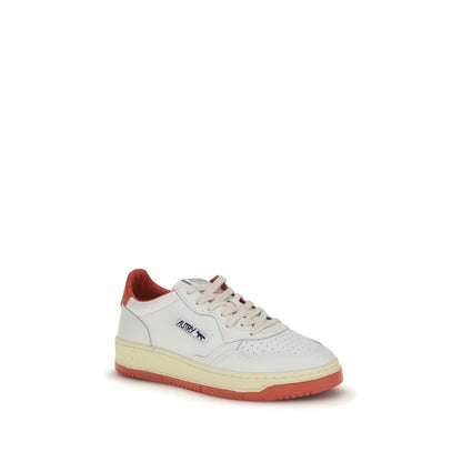 Autry White Leather Athletic Sneakers with red heel and sole, blue logo, collaboration with Maison Kitsuné, contemporary sporty design.