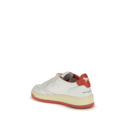 Autry White Leather Athletic Sneakers with red heel detail and collaboration logo, showcasing sporty and contemporary design. AW25 Collection.