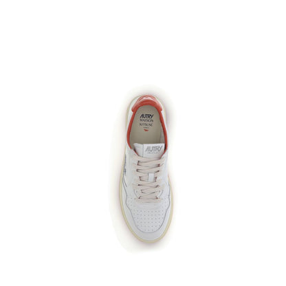 Top view of Autry White Leather Athletic Sneakers showing red heel details and white laces.