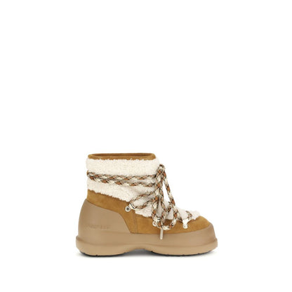 Moon Boot Beige Leather Ankle Boots with shearling and crossover laces, featuring a non-slip rubber tread and lightweight EVA midsole.