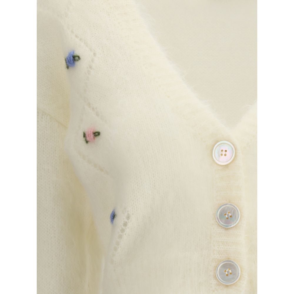 Alessandra Rich White Mohair Cardigan with floral embroidery, V-neckline, button closure, and ribbed details, close-up view.