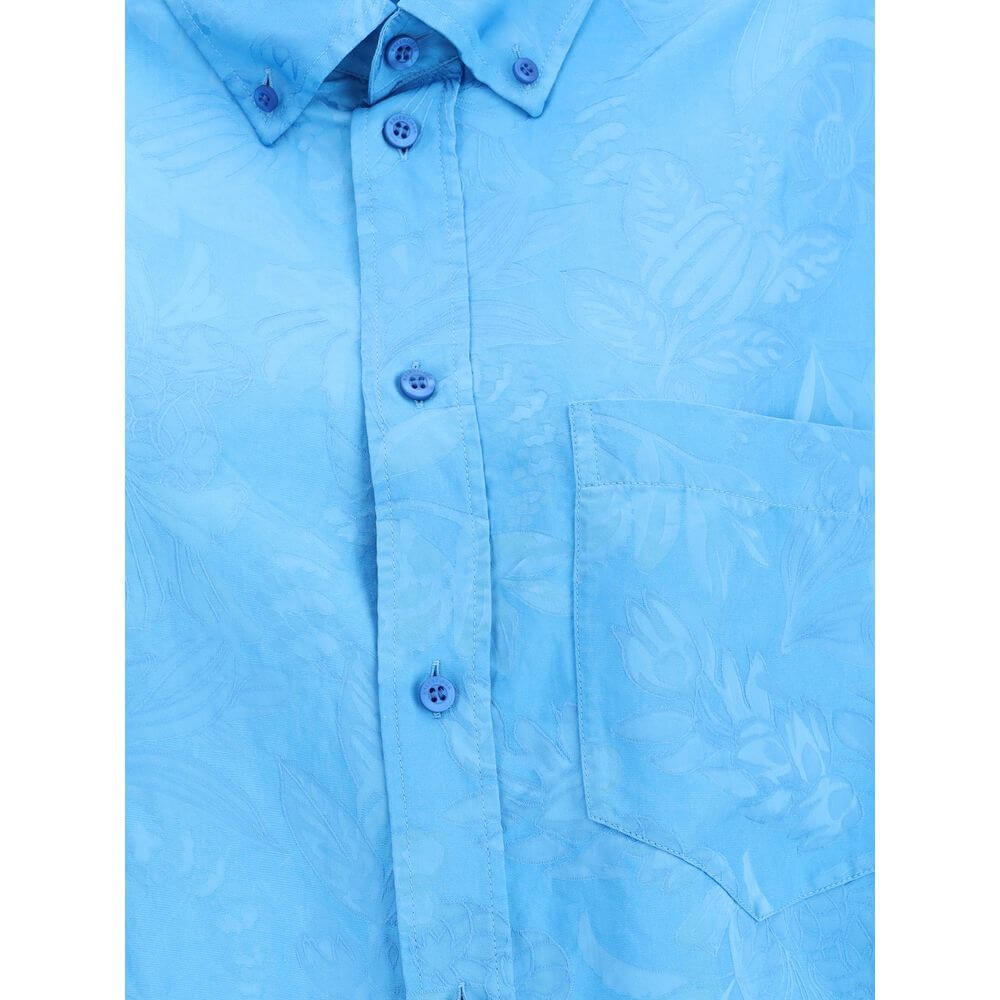 Balenciaga Blue Viscose Pattern Shirt with floral design, featuring button-down collar and chest pocket close-up view.