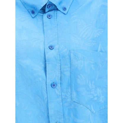 Balenciaga Blue Viscose Pattern Shirt with floral design, featuring button-down collar and chest pocket close-up view.
