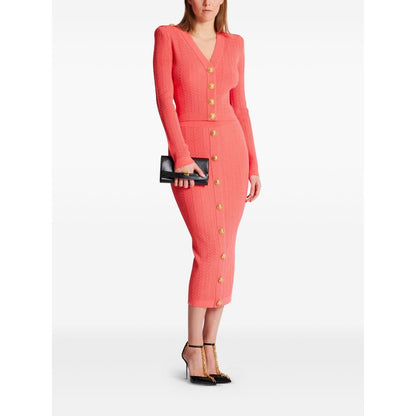 Balmain Long-sleeved twisted knit cardigan Topwear