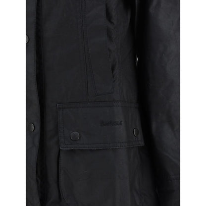 Barbour Black Cotton Coat with zip, ribbed collar, patch pockets, tartan lining, iconic monogram, and adjustable vents.