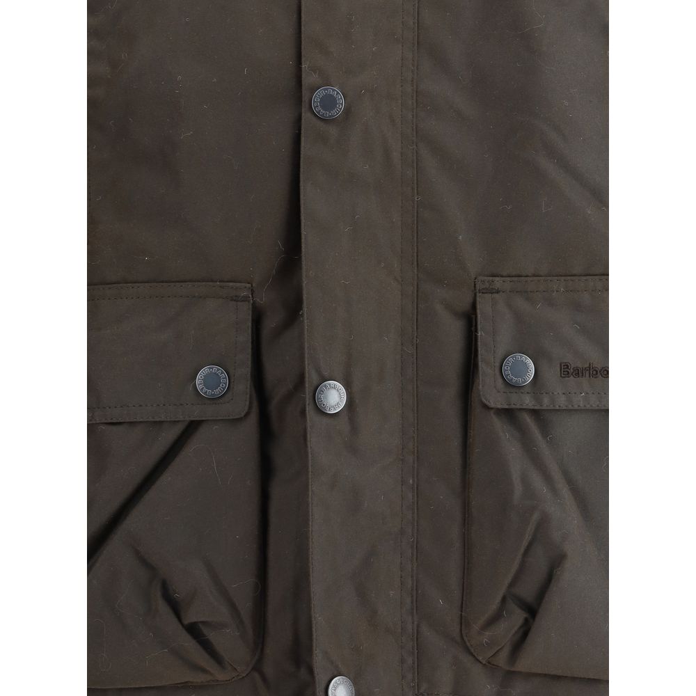 Close-up of Barbour Brown Cotton Rain Coat with button flap pockets showcasing waterproof material and classic design.