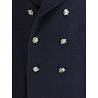 Brunello Cucinelli Blue Wool Coat with metal button closure and classic lapel, showcasing refined design and functionality.