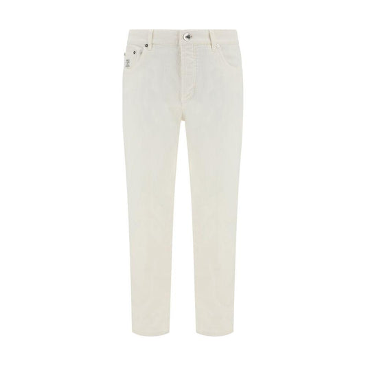 Brunello Cucinelli Jeans with turn-up hemBrunello Cucinelli’s cotton Jeans are a timeless and versatile piece with a classic five-pocket design. The front button closure and belt loops at the waistband allow for a comfortable and adjustable fit. The disti
