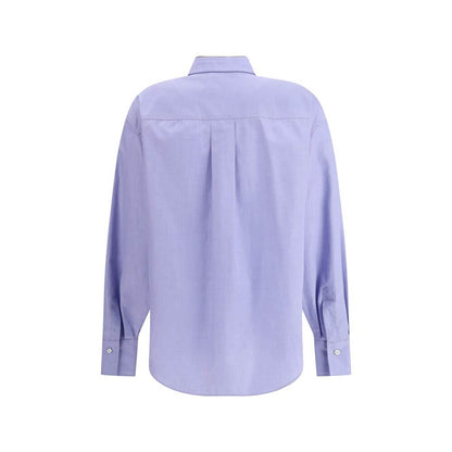 Back view of Brunello Cucinelli Light Blue Cotton Dress Shirt with classic collar and buttoned cuffs, showcasing asymmetrical hemline.