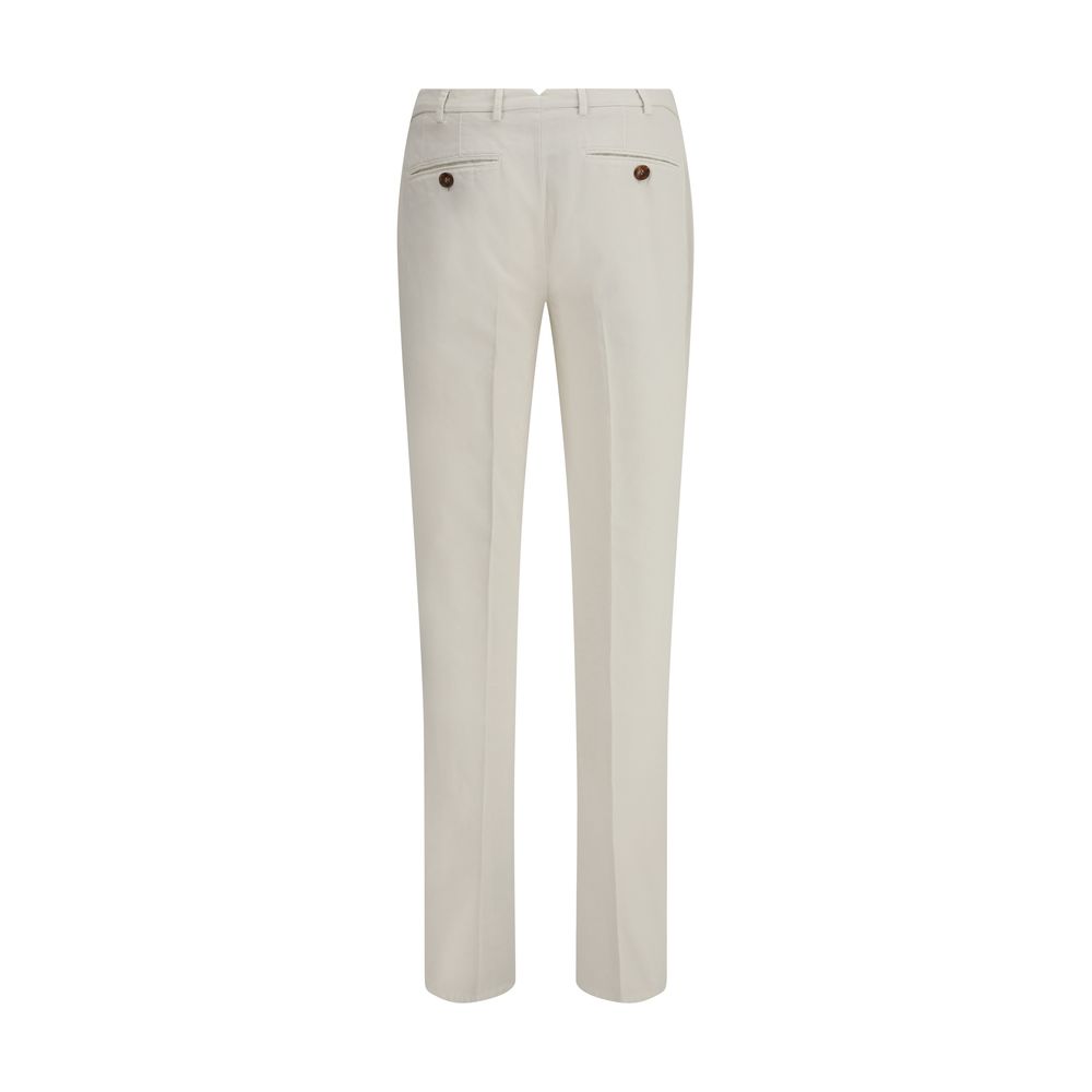 Back view of Brunello Cucinelli White Cotton Casual Pants with belt loops and welt pockets, showcasing elegant craftsmanship.